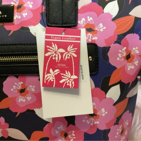 Trina Turk NWT Large Narcissus vegan leather shoulder bag with long strap.